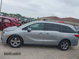 2019 Honda Odyssey EX with VIN 5FNRL6H53KB129212, listed as a IAAI auction lot 42474440 with 142,431 mi miles and . Bid and sale history available at DreamBid. Image 14.