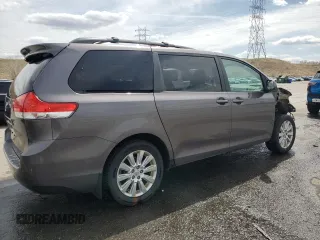 2012 Toyota Sienna LE with VIN 5TDJK3DC8CS047122, listed as a Copart auction lot 52036115 with 76,869 mi miles and Salvage Title. Bid and sale history available at carsss.com. Image 3.