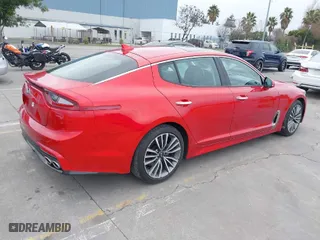 2019 Kia Stinger with VIN KNAE15LA7K6063792, listed as a IAAI auction lot 41490932 with 19,806 mi miles. Bid and sale history available at carsss.com. Image 4.