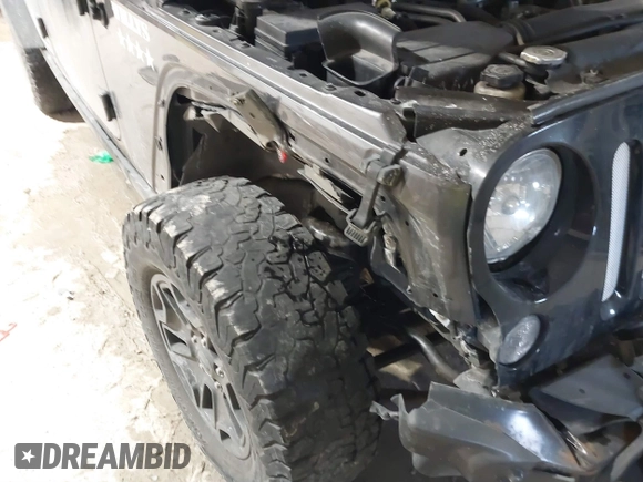 2016 Jeep Wrangler Unlimited Sport with VIN 1C4BJWDG2GL210060, listed as a IAAI auction lot 41546979 with 13,542 mi miles and . Bid and sale history available at DreamBid. Image 6.