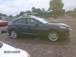 2017 Mazda 3 Touring with VIN 3MZBN1L79HM122581, listed as a IAAI auction lot 42705624 with 52,175 mi miles and . Bid and sale history available at DreamBid. Image 14.