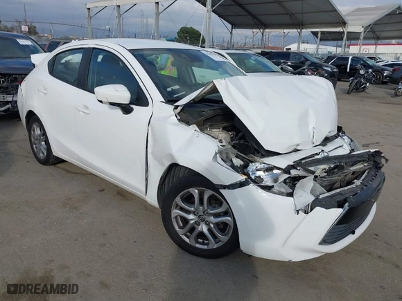 2016 Scion iA with VIN 3MYDLBZV9GY139080, listed as a IAAI auction lot 41494384 with 106,092 mi miles. Bid and sale history available at carsss.com. Image 1.