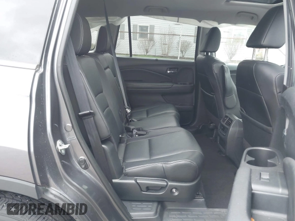 2020 Honda Pilot EX-L z VIN 5FNYF6H53LB059294, wystawiony jako IAAI lot #41910511 z przebiegiem 55 737 mil mil oraz . Historia ofert i sprzedaży dostępna na DreamBid. Obrazek 8.