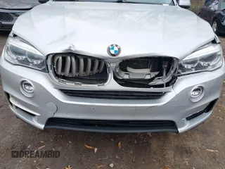 2016 BMW X5 xDrive50i with VIN 5UXKR6C53G0J83329, listed as a IAAI auction lot 41150598 with 81,136 mi miles. Bid and sale history available at carsss.com. Image 6.