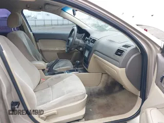 2006 Ford Fusion S with VIN 3FAFP06Z56R114621, listed as a IAAI auction lot 41901022 with 234,238 mi miles. Bid and sale history available at carsss.com. Image 5.