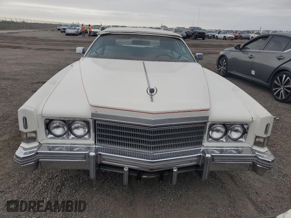 1974 Cadillac Eldorado z VIN 6L67S4Q408046, wystawiony jako Copart lot #77112024 z przebiegiem 97 414 mil mil oraz Szkoda całkowita • Salvage title. Historia ofert i sprzedaży dostępna na DreamBid. Obrazek 5.