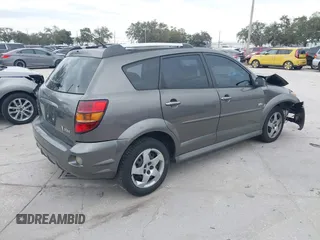 2007 Pontiac Vibe with VIN 5Y2SL65827Z427154, listed as a IAAI auction lot 41356334 with 105,526 mi miles. Bid and sale history available at carsss.com. Image 4.