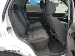 2003 Ford Escape XLT Popular 2 with VIN 1FMYU93133KD76423, listed as a Copart auction lot 57780455 with 98,779 mi miles and Salvage title. Bid and sale history available at DreamBid. Image 10.