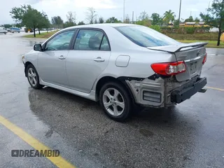 2013 Toyota Corolla L with VIN 5YFBU4EE7DP209207, listed as a IAAI auction lot 41990086 with 168,269 mi miles. Bid and sale history available at carsss.com. Image 3.