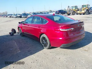 2019 Ford Fusion SE with VIN 3FA6P0HD1KR166565, listed as a IAAI auction lot 41961294 with 99,355 mi miles. Bid and sale history available at carsss.com. Image 3.