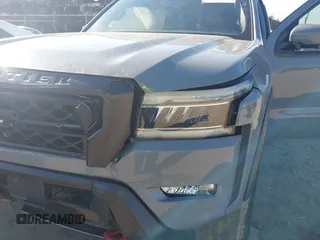 2023 Nissan Frontier Pro-4X with VIN 1N6ED1EK7PN604374, listed as a IAAI auction lot 41828936 with 60,452 mi miles and . Bid and sale history available at DreamBid. Image 6.