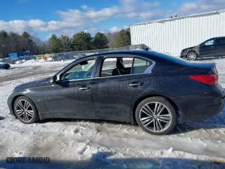 2014 Infiniti Q50 Premium with VIN JN1BV7AR0EM696474, listed as a IAAI auction lot 41652900 with 87,946 mi miles. Bid and sale history available at carsss.com. Image 14.