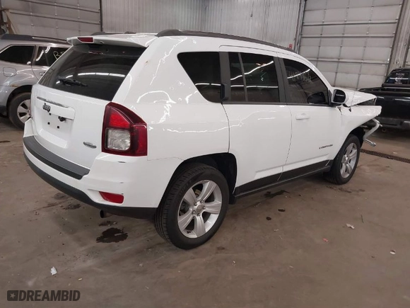 2014 Jeep Compass Latitude with VIN 1C4NJDEB1ED623034, listed as a IAAI auction lot 41843519 with 118,220 mi miles. Bid and sale history available at carsss.com. Image 4.