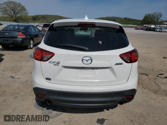 2015 Mazda CX-5 Grand Touring with VIN JM3KE4DY3F0496994, listed as a Copart auction lot 56093965 with 184,256 mi miles and Non Repairable. Bid and sale history available at DreamBid. Image 6.