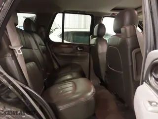 2004 GMC Envoy SLE with VIN 1GKDT13S542265104, listed as a IAAI auction lot 41884797 with 154,190 mi miles. Bid and sale history available at carsss.com. Image 8.