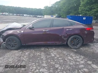 2017 Kia Optima LX with VIN 5XXGT4L34HG152537, listed as a IAAI auction lot 42520082 with 145,004 mi miles and . Bid and sale history available at DreamBid. Image 14.