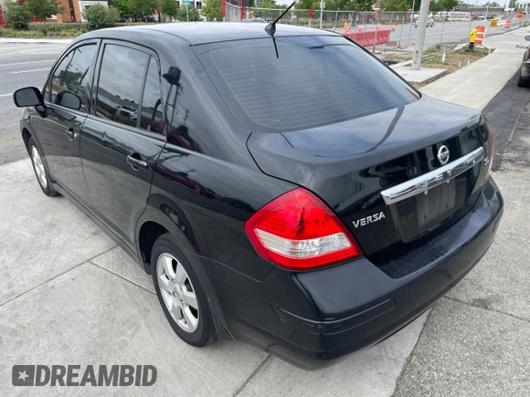 2011 Nissan Versa S with VIN 3N1BC1AP4BL410195, listed as a Copart auction lot 56341625 with 201,351 mi miles and Clean title. Bid and sale history available at DreamBid. Image 3.