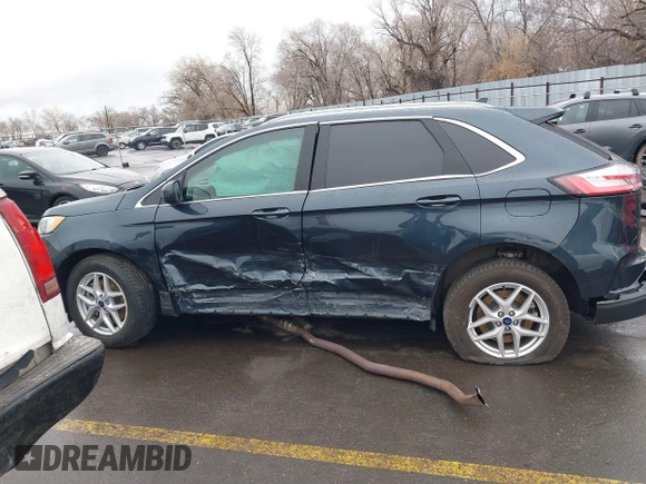 2022 Ford Edge SEL z VIN 2FMPK4J90NBA71360, wystawiony jako IAAI lot #41724316 z przebiegiem 35 309 mil mil oraz . Historia ofert i sprzedaży dostępna na DreamBid. Obrazek 15.
