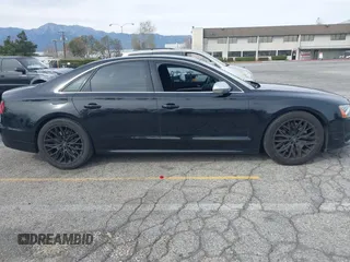 2013 Audi S8 with VIN WAUD2AFD0DN028673, listed as a IAAI auction lot 41689320 with 115,502 mi miles. Bid and sale history available at carsss.com. Image 13.