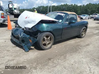1999 Mazda MX-5 Miata with VIN JM1NB3536X0125163, listed as a Copart auction lot 61210495 with Not provided miles and Salvage title. Bid and sale history available at DreamBid. Image 1.