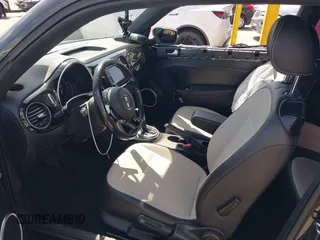 2017 Volkswagen Beetle 1.8T SE with VIN 3VWJ17ATXHM612411, listed as a IAAI auction lot 41900371 with 101,419 mi miles. Bid and sale history available at carsss.com. Image 5.