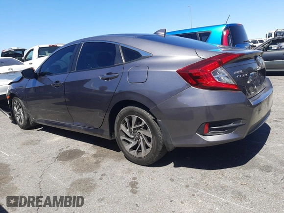 2018 Honda Civic EX с VIN 19XFC2F79JE040927, выставлен на аукционе Copart как лот 55696165 с пробегом 58 696 миль миль и Списание • Salvage title. История ставок и продаж доступна на DreamBid. Изображение 2.
