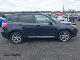 2015 Subaru Forester Touring with VIN JF2SJAWC0FH585722, listed as a IAAI auction lot 41734016 with 90,728 mi miles and . Bid and sale history available at DreamBid. Image 13.