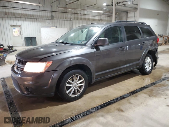 2016 Dodge Journey SXT with VIN 3C4PDDBG8GT242018, listed as a Copart auction lot 52899665 with 132,567 mi miles and Salvage Title. Bid and sale history available at DreamBid. Image 1.