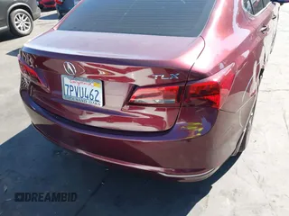 2016 Acura TLX with VIN 19UUB1F32GA000977, listed as a IAAI auction lot 41626510 with 124,916 mi miles. Bid and sale history available at carsss.com. Image 17.