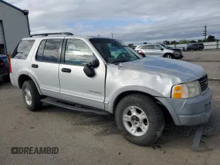 2002 Ford Explorer XLS with VIN 1FMZU72E02UA28983, listed as a Copart auction lot 56871915 with Not provided miles and Salvage title. Bid and sale history available at DreamBid. Image 4.