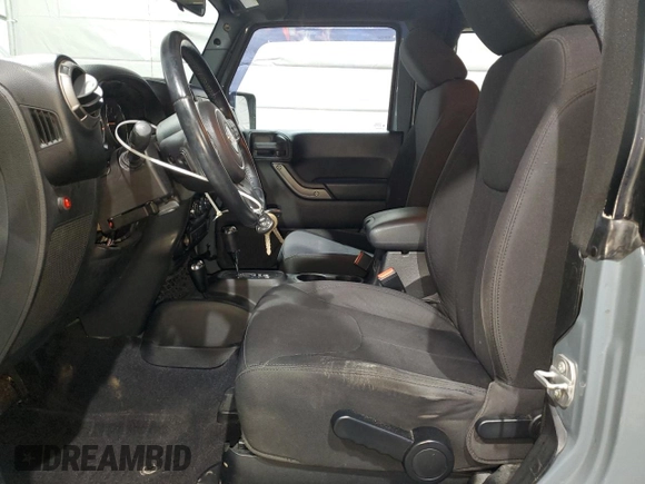 2014 Jeep Wrangler Sport with VIN 1C4AJWAG9EL322982, listed as a Copart auction lot 51145075 with 122,686 mi miles and Salvage Title. Bid and sale history available at DreamBid. Image 7.