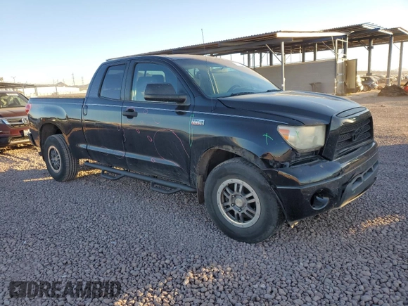 2009 Toyota Tundra 4WD Truck with VIN 5TFBW54189X091241, listed as a Copart auction lot 80255974 with 380,902 mi miles and Salvage Title. Bid and sale history available at carsss.com. Image 4.