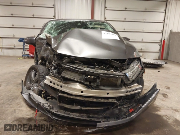 2021 Honda Odyssey Touring with VIN 5FNRL6H82MB025923, listed as a IAAI auction lot 42104290 with 61,178 mi miles and . Bid and sale history available at DreamBid. Image 13.
