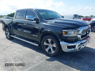 2019 Ram 1500 Laramie z VIN 1C6RREJT0KN558110, wystawiony jako IAAI lot #42392391 z przebiegiem 103 484 mil mil oraz . Historia ofert i sprzedaży dostępna na DreamBid. Obrazek 1.