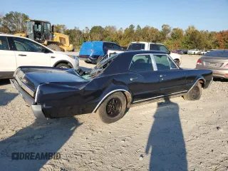 1967 Oldsmobile Cutlass z VIN 336697W359400, wystawiony jako Copart lot #77526904 z przebiegiem 60 690 mil mil oraz Szkody całkowita. Historia ofert i sprzedaży dostępna na DreamBid. Obrazek 3.