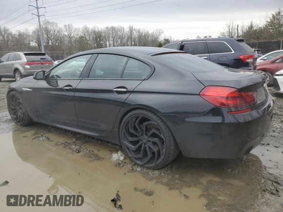 2015 BMW 6 Series 640i xDrive z VIN WBA6B8C5XFD453762, wystawiony jako Copart lot #44228965 z przebiegiem 105 188 mil mil oraz Szkoda całkowita • Salvage title. Historia ofert i sprzedaży dostępna na DreamBid. Obrazek 2.