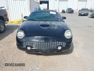 2002 Ford Thunderbird w/Hardtop Premium with VIN 1FAHP60A72Y129115, listed as a IAAI auction lot 41768100 with 54,393 mi miles. Bid and sale history available at carsss.com. Image 12.