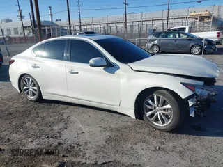 2014 Infiniti Q50 with VIN JN1BV7AP5EM678664, listed as a IAAI auction lot 41641222 with 86,385 mi miles and . Bid and sale history available at carsss.com. Image 13.