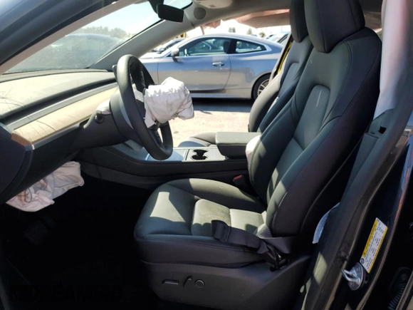 2024 Tesla Model Y Long Range с VIN 7SAYGDEE4RA243738, выставлен на аукционе Copart как лот 48953885 с пробегом Не указан миль и Списание • Salvage title. История ставок и продаж доступна на DreamBid. Изображение 7.
