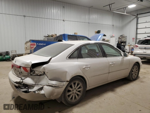 2009 Hyundai Azera Limited z VIN KMHFC46F09A372929, wystawiony jako Copart lot #88455705 z przebiegiem 111 222 mil mil oraz Szkoda całkowita • Salvage title. Historia ofert i sprzedaży dostępna na DreamBid. Obrazek 3.