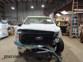 2021 Ford F-150 XL with VIN 1FTMF1CB6MKF13315, listed as a IAAI auction lot 42297728 with 74,450 mi miles and . Bid and sale history available at DreamBid. Image 13.
