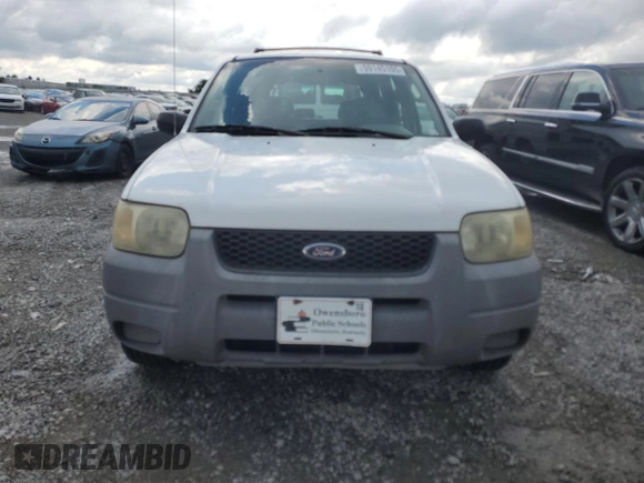 2001 Ford Escape XLS with VIN 1FMYU02161KB01283, listed as a Copart auction lot 59145105 with 86,195 mi miles and Salvage title. Bid and sale history available at DreamBid. Image 5.