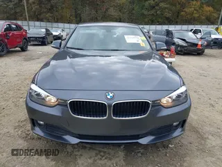 2014 BMW 3 Series 328d xDrive with VIN WBA3D5C59EKX96701, listed as a IAAI auction lot 40716972 with 163,775 mi miles. Bid and sale history available at carsss.com. Image 12.