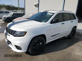2019 Jeep Grand Cherokee Trackhawk with VIN 1C4RJFN92KC564748, listed as a Copart auction lot 82677504 with 48,528 mi miles and Salvage title. Bid and sale history available at DreamBid. Image 1.