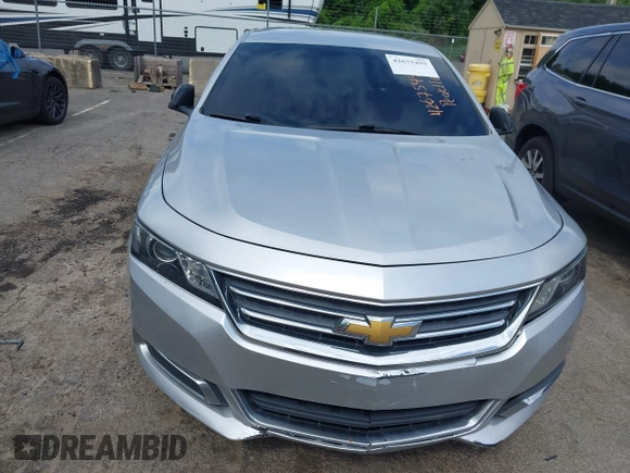 2014 Chevrolet Impala LT with VIN 2G1115SL4E9279660, listed as a IAAI auction lot 42675495 with 159,215 mi miles and . Bid and sale history available at DreamBid. Image 17.