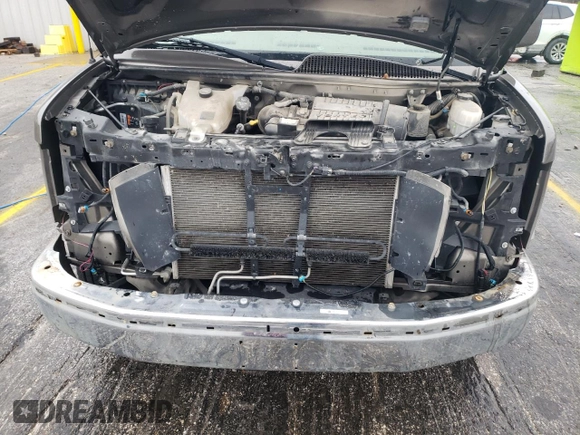 2019 Chevrolet Express Cargo z VIN 1GCWGBFG9K1233619, wystawiony jako Copart lot #78674184 z przebiegiem 102 580 mil mil oraz Szkoda całkowita • Salvage title. Historia ofert i sprzedaży dostępna na DreamBid. Obrazek 12.