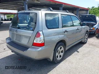 2007 Subaru Forester X with VIN JF1SG63617H732016, listed as a IAAI auction lot 42192854 with 99,807 mi miles and . Bid and sale history available at DreamBid. Image 4.