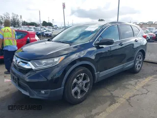 2017 Honda CR-V EX with VIN 7FARW1H55HE009693, listed as a IAAI auction lot 41539260 with 136,645 mi miles. Bid and sale history available at carsss.com. Image 2.