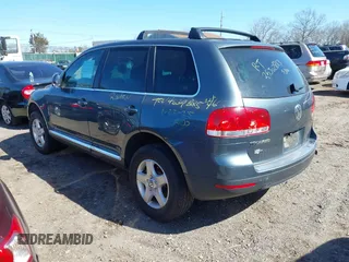 2005 Volkswagen Touareg 3.2L V6 with VIN WVGZG77L65D079228, listed as a IAAI auction lot 41832037 with Not Provided miles and . Bid and sale history available at DreamBid. Image 3.
