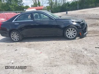 2016 Cadillac CTS RWD with VIN 1G6AP5SX0G0118831, listed as a IAAI auction lot 42105091 with 123,507 mi miles and . Bid and sale history available at DreamBid. Image 14.